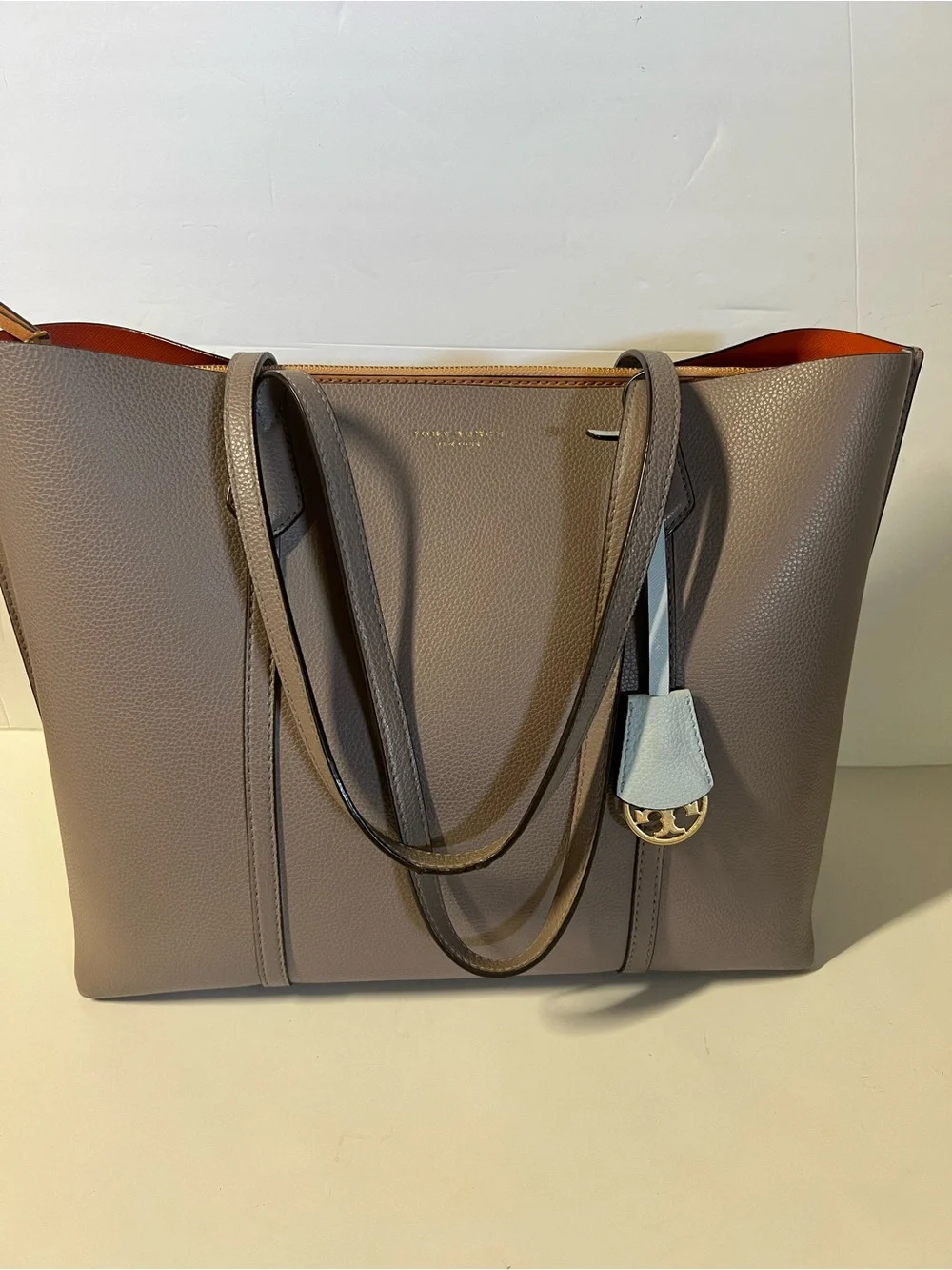 Tory Burch Taupe Pebbled Leather Tote with Light Blue Charm